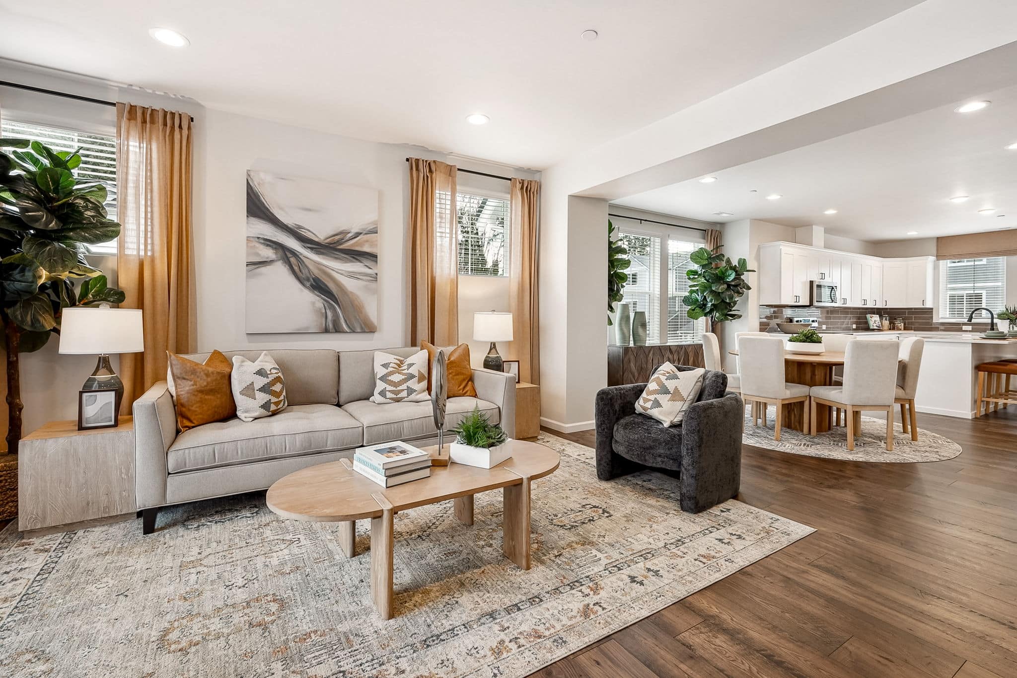 Seating are near the dining room in the Noble at Shaw Heights by Soundbuilt Homes