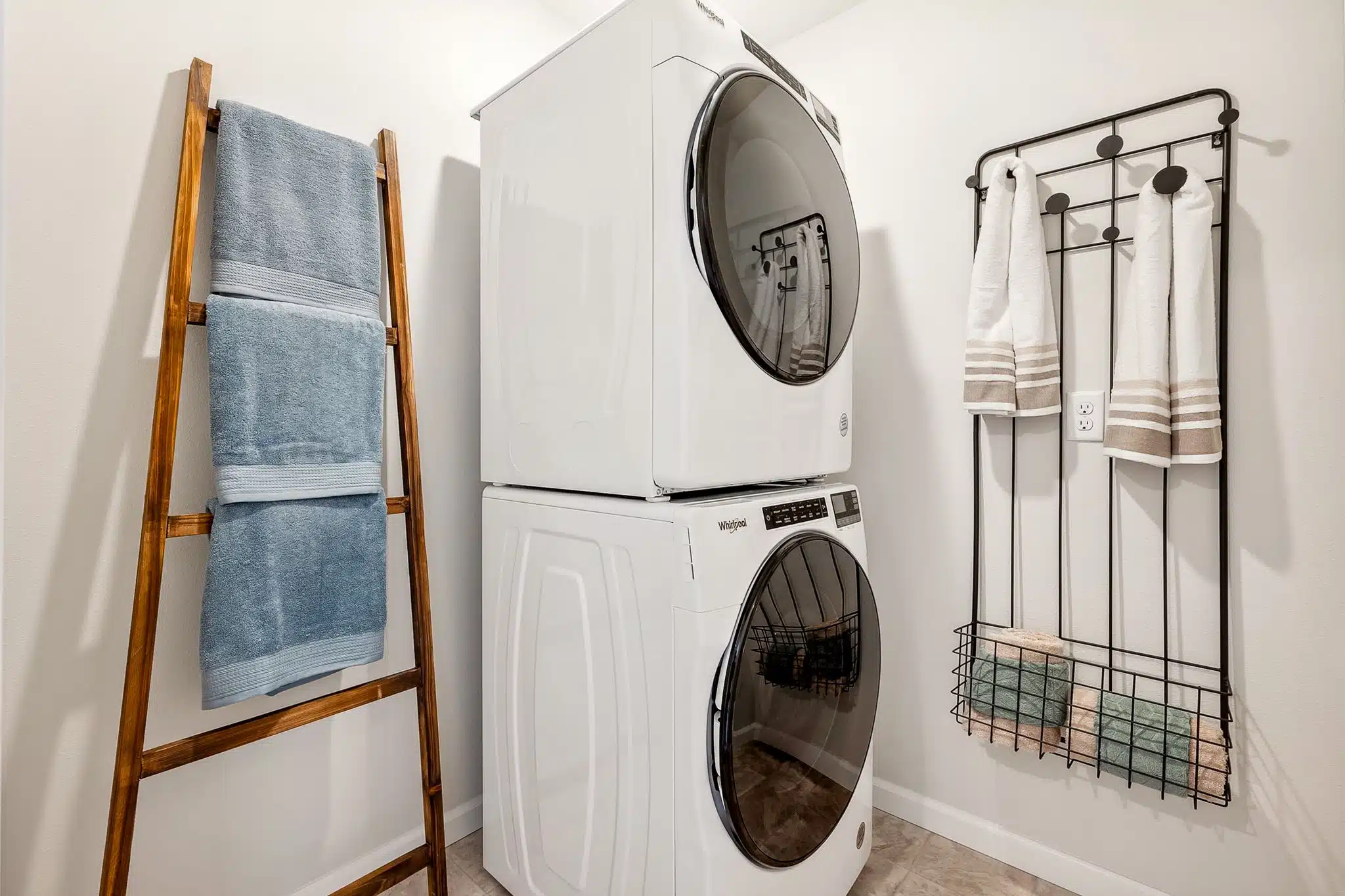 Stacking laundry appliances in the laundry room of the Noble model at Shaw Heights.