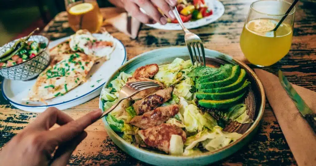 Two people eating at a restaurant in Phoenix.