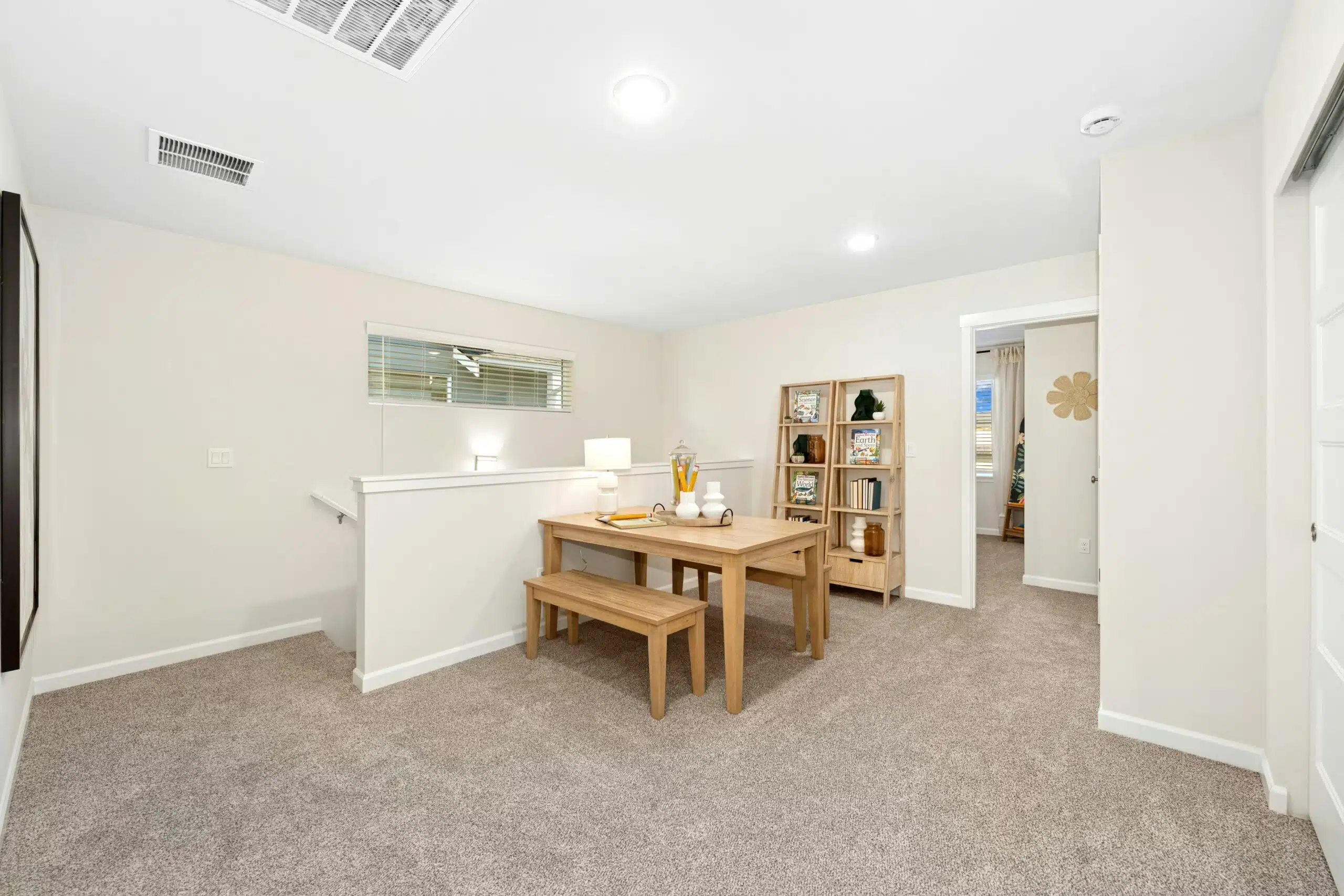 Upstairs loft/bonus area with full carpeting.